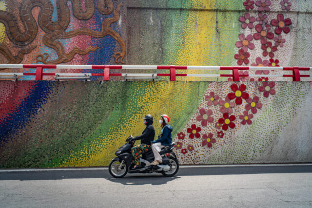 motorbike with flowers coming from the exhaust in Vietnam