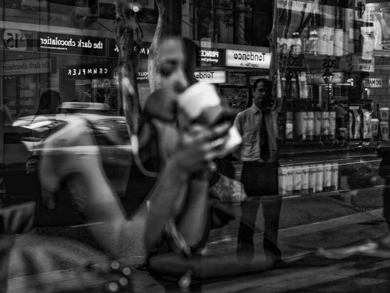 Time to reflect person drinking coffee with a reflection